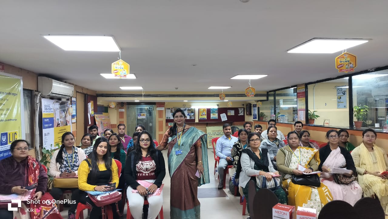 car interior from central back seat position showing driver and blurred view through windscreen of a busy road at night